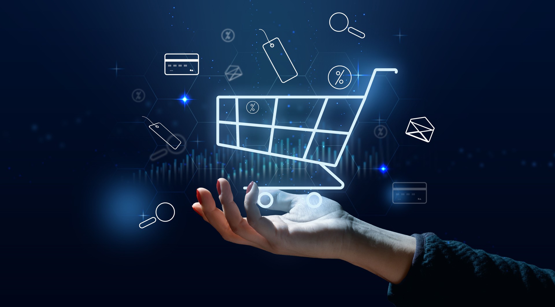 A female hand and a shopping cart icon, concept of starting a sale, online shopping, increasing business profits during seasonal discounts.